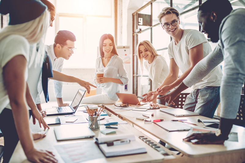 Young people work in modern office